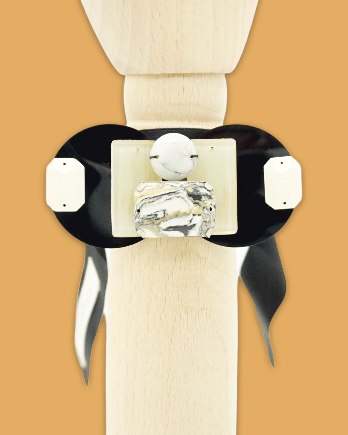 Beige bracelet featuring ribbon tie-up, plastic beads, marble print bead, handmade.