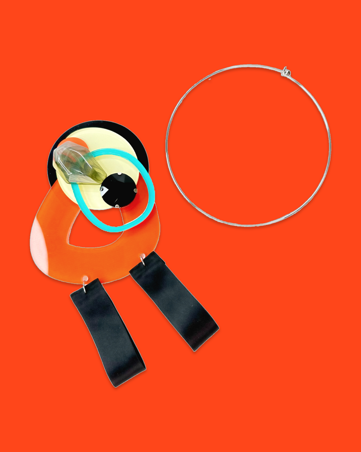 Detachable geometric scarlet necklace brooch with acrylic hardware and silk ribbon fastening.
