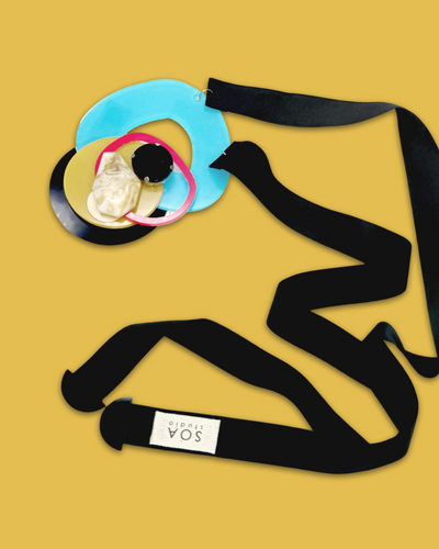 Bold fashion necklace brooch with arctic colors, featuring irregular acrylic shapes, sequins, plastic gem, and silk ribbon fastening.