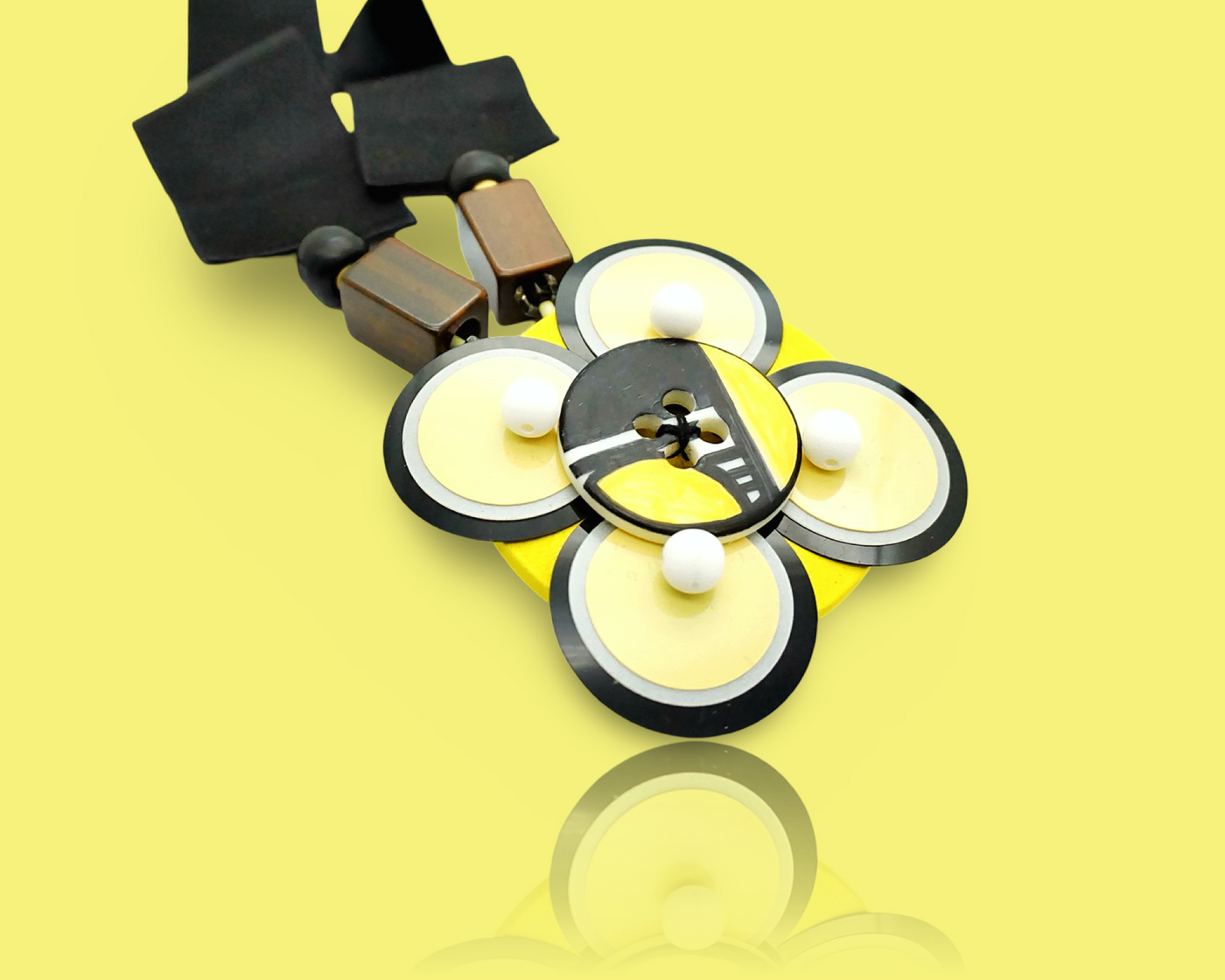 Banana yellow necklace with hand-drawing button and black silk ribbon.