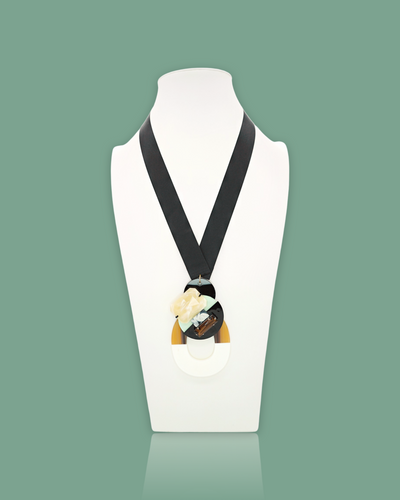 Chic bold classy style design necklace in mint color with Korean buffalo horn pendant, gemstone, and black sequins on a silk ribbon.