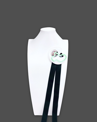 Geometric Shapes Necklace Brooch in White Colour with acrylic, marble pattern, sequins, and silk ribbon.