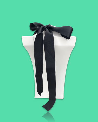 Artistic bold fashion necklace with oversized seafoam pendant and black rhinestone accents, featuring silk ribbon fastening.