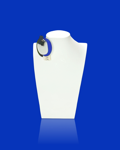 Modern zaffre blue brooch on display mannequin.