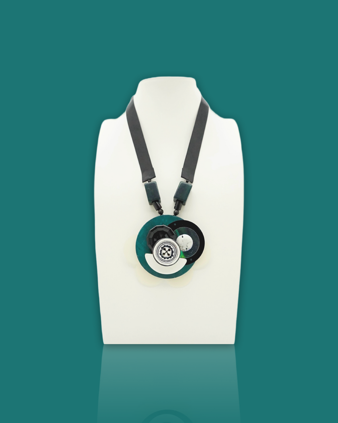 Ocean colour necklace with hand-drawn button, black sequins, wood button, polyester ribbon, handmade design.
