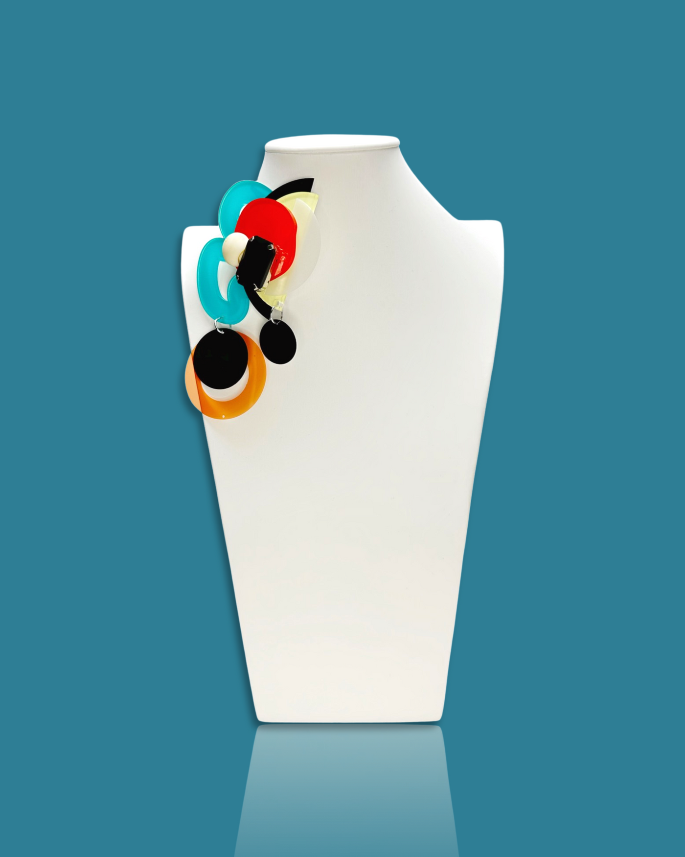 Geometric-shaped fashion brooch in cerulean, die-cut acrylic with sequins and beads.