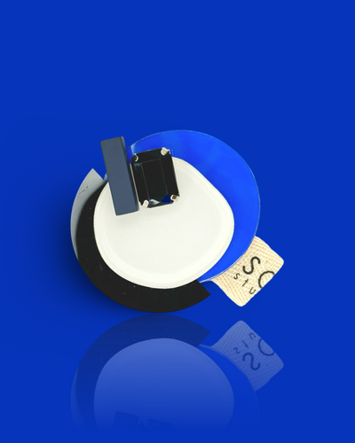 Modern blue brooch with rectangular gemstone and die-cut acrylic hardware.