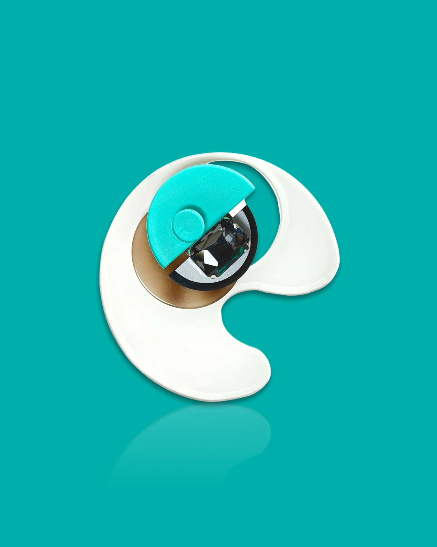 Geometric-shaped trendy brooch in cyan and white with gemstone and acrylic.
