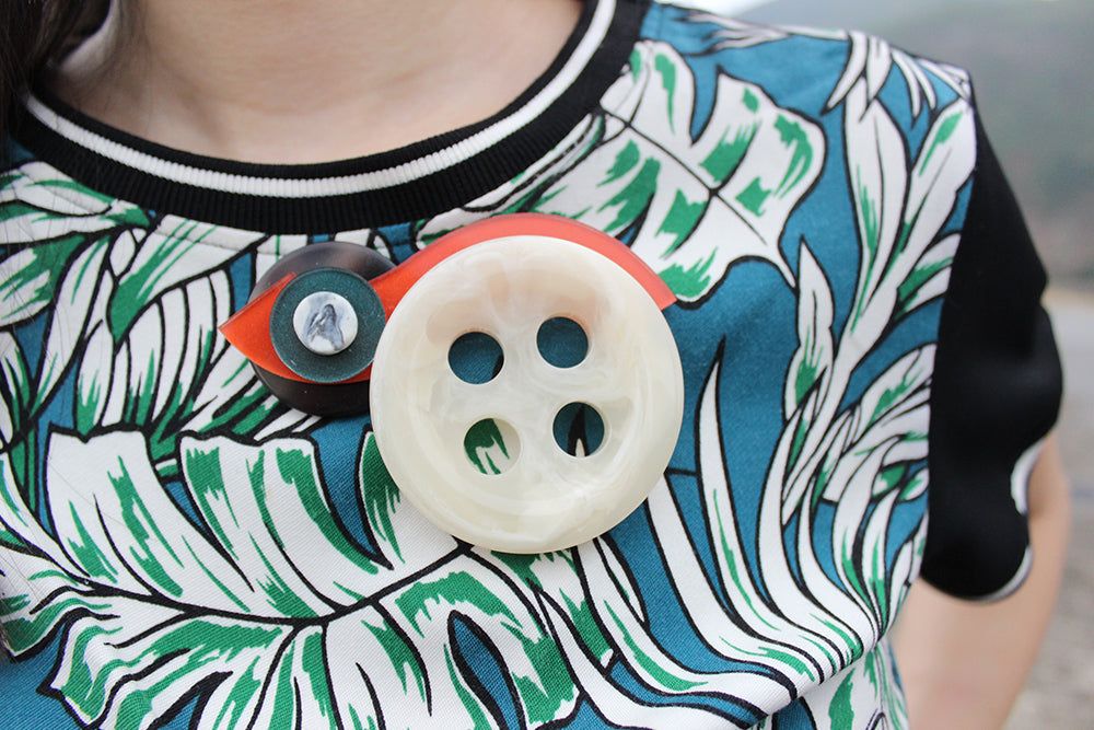 Bold Button Bar-Pin Brooch in Tiger Colour with geometric design, hand-made from plastic beads and polymer clay.