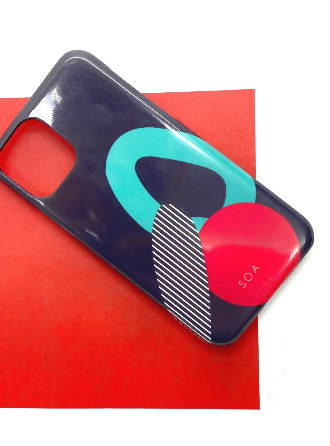 Black phone case with colorful abstract design for pre-order.